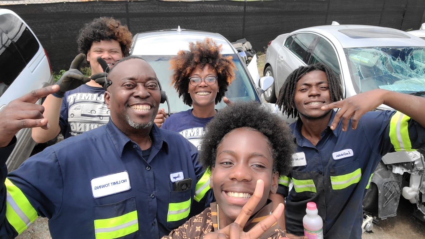 smiling employees of Jordan's Cash 4 Junk Cars